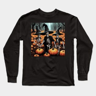 Three Skeletons Wearing Witches Costume In A Pumpkin Patch Long Sleeve T-Shirt